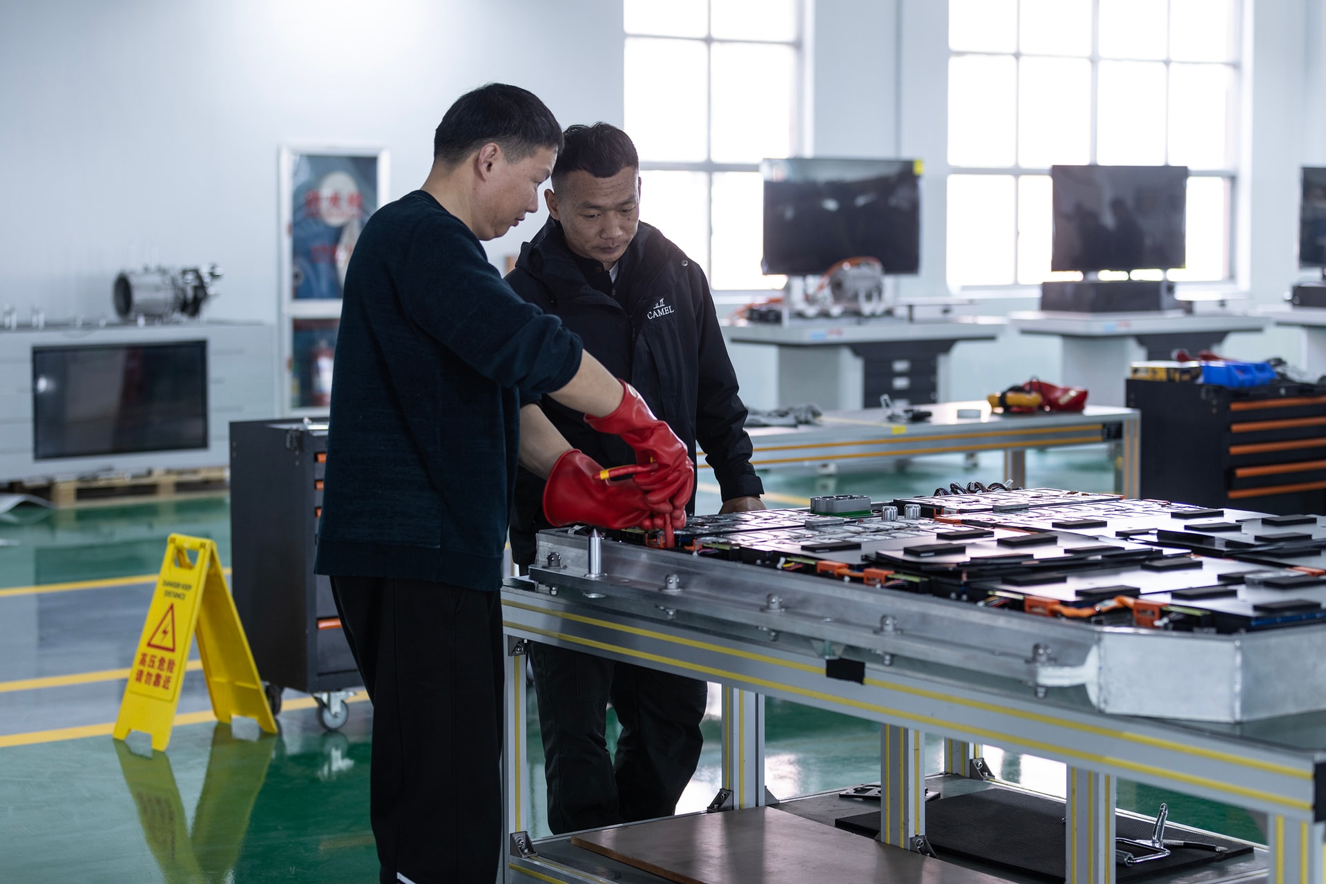 BTKX technicians carrying out a battery pack inspection