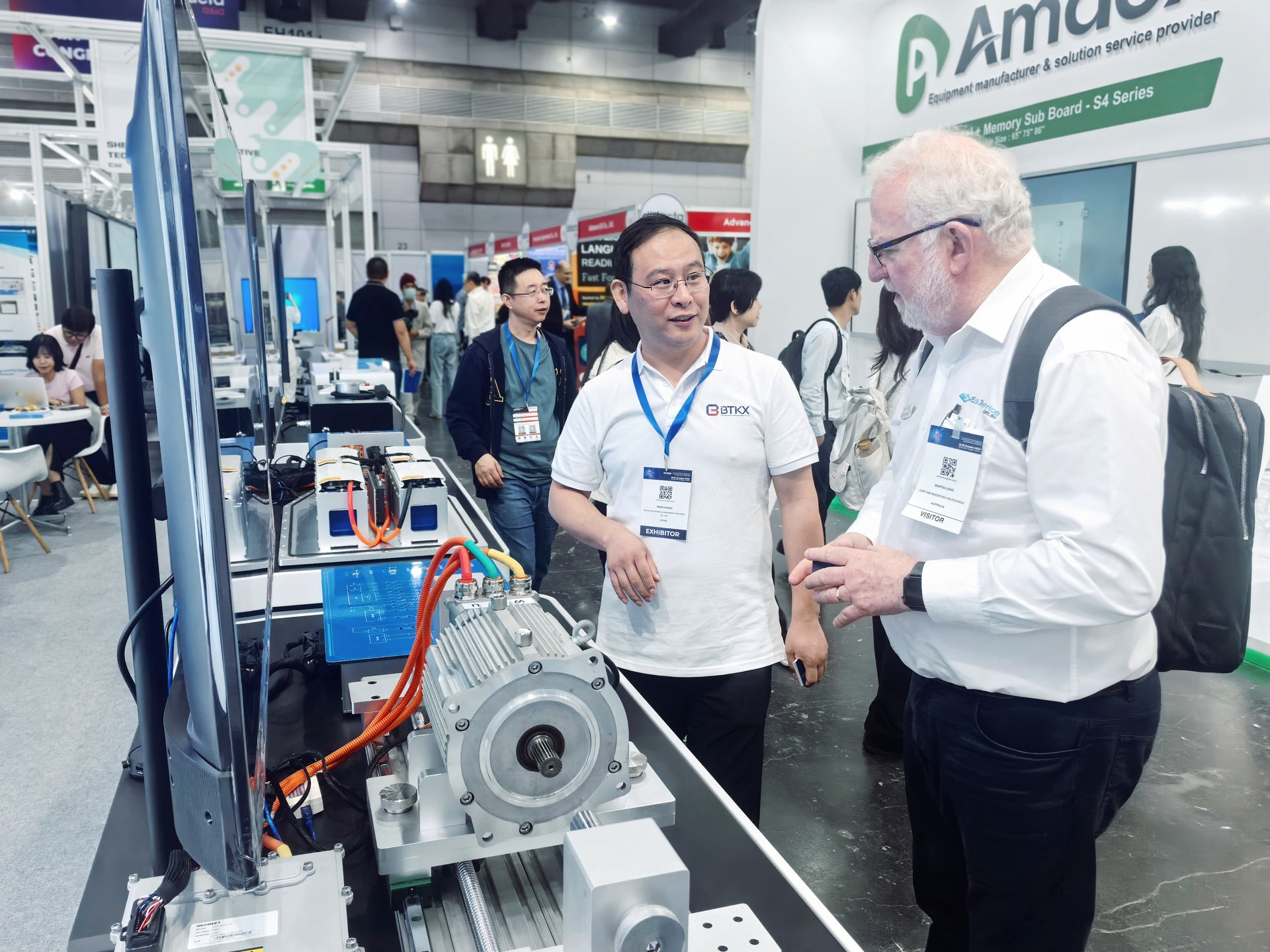 Visitor reviewing related BTKX automotive training equipment